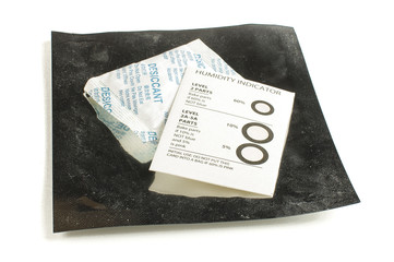 Sensitive electronic packing electrostatic bag, humidity indicator card and desiccant bag isolated...