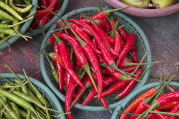 Red chili pepper in the basket for sale in the wet market