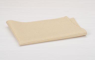 Natural Cotton Napkin On White Painted Wood Background