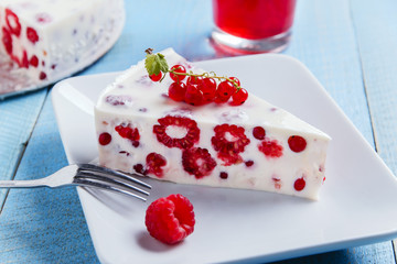 dessert cake of cream and berries