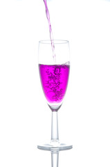 purple cocktail in glass on white background