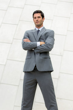 Vertical Shot Of Very Confident Smug Cocky Business Man Executive Posing Powerful Stance