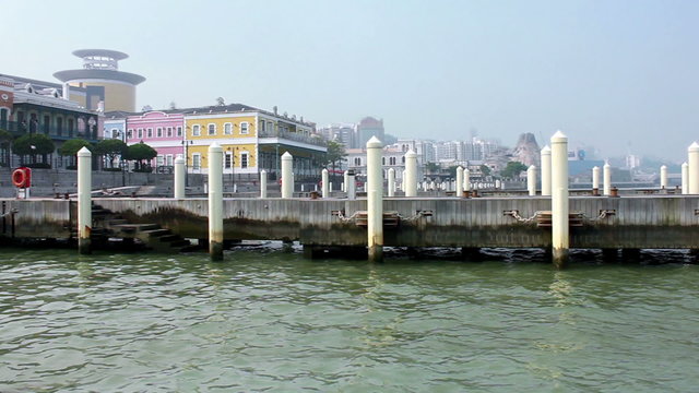 A peaceful view of empty mooring posts at Macau Fisherman's Wharf