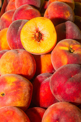 Juicy super fruit, ripe peaches at local fruit market bazaar