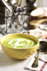 Cream soup with potato and green peas