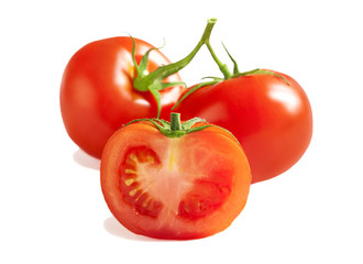 Fresh Tomatoes. Whole and a half isolated on white background