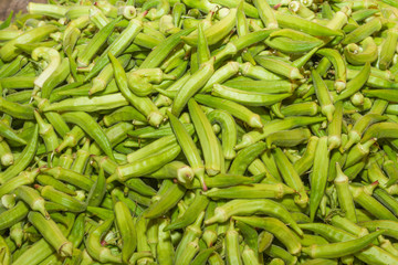 Fresh harvested okra vegetable at local fruit market