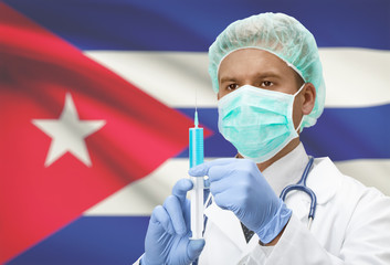 Doctor with syringe in hands and flag on background series - Cuba