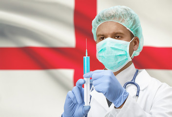 Doctor with syringe in hands and flag on background series - England