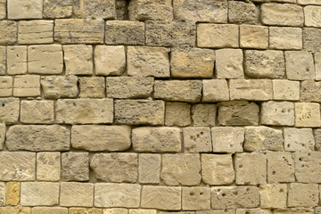 Beige stone brick wall texture