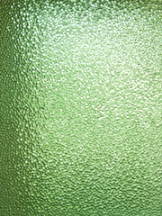 Glass textured background in green