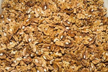 Crispy walnut seeds on an open air food market.