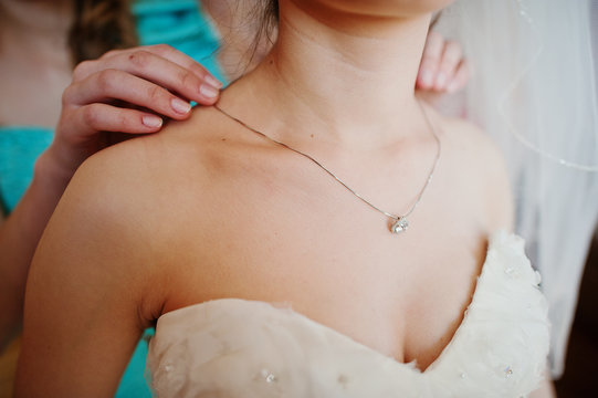 bridesmaid tie bride  pendant on her neck
