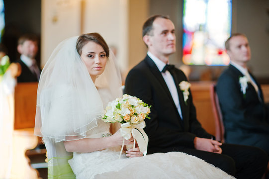 christian wedding couple at catholic church