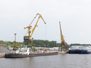 Dockside crane barge ship rubble