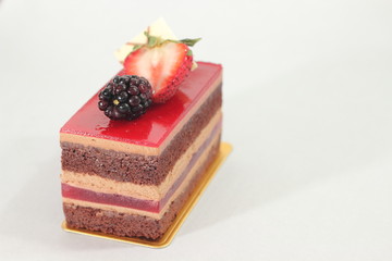 A Chocolate strawberry cake on white background.
