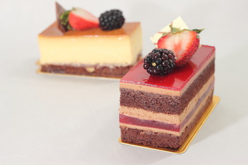  Chocolate strawberry cake on white background.