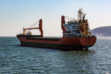 Cargo Ship Sailing in Ocean