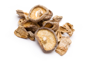 Dried Shiitake Mushrooms – Dried shiitake mushrooms on a white background.