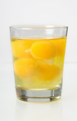 Raw Eggs in a Glass – Raw eggs floating in a glass. 