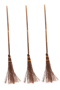 Witches broomsticks on white background