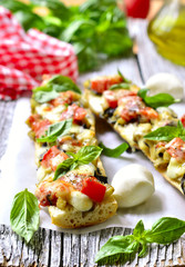 Pizza with eggplants on a french baguette.