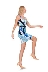 Blond hair girl in mini blue dress isolated on white