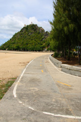 Fototapeta na wymiar walkway on the beach and mountain