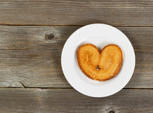 Heart Shaped Cookie On White Plate