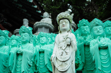 Buddas of Jeju. Line of buddhas of Sanbanggulsa Temple complex in Jeju Island, Korea
