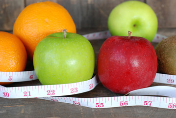 Green apple, Red apple. Fruit Diet concept on a wooden floor.