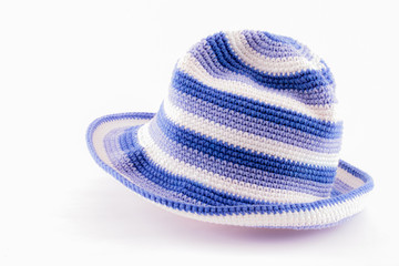 Knitted wool hat isolated on white background.