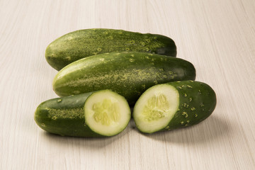Fresh cucumber on the wooden table