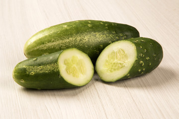 Fresh cucumber on the wooden table
