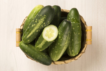 Fresh cucumber on the wooden table