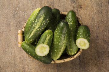 Fresh cucumber on the wooden table