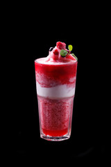 Raspberry smoothie on black background