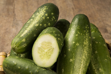 Fresh cucumber on the wooden table