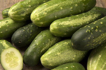 Fresh cucumber on the wooden table