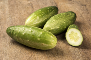 Fresh cucumber on the wooden table