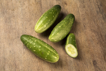 Fresh cucumber on the wooden table