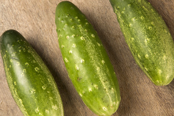 Fresh cucumber on the wooden table