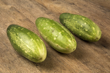 Fresh cucumber on the wooden table