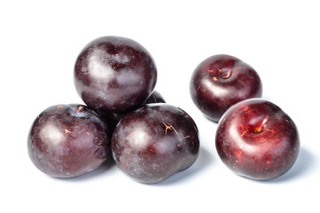 fresh plum on white, tilt shift lens