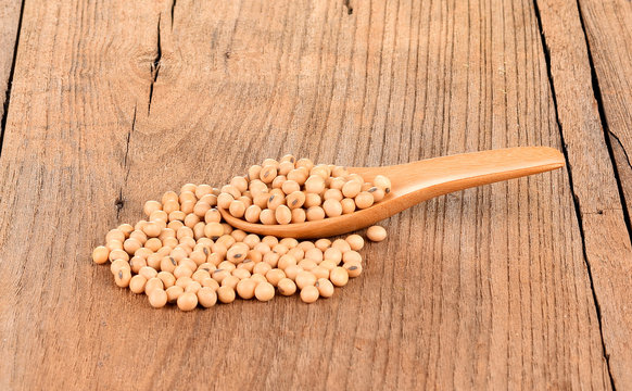 Soy beans on wood table.