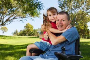 Disabled dad play with daughter