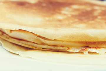 Sweet pancake on white plate