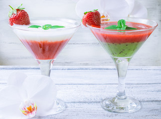 Fresh fruit and berry cocktail  on shabby wooden boards