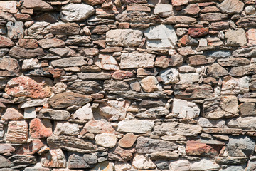 dry stone wall made of irregular shaped stones