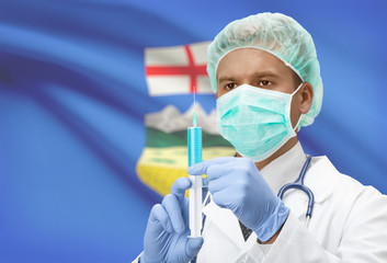 Doctor with syringe in hands and Canadian province flag on background series - Alberta